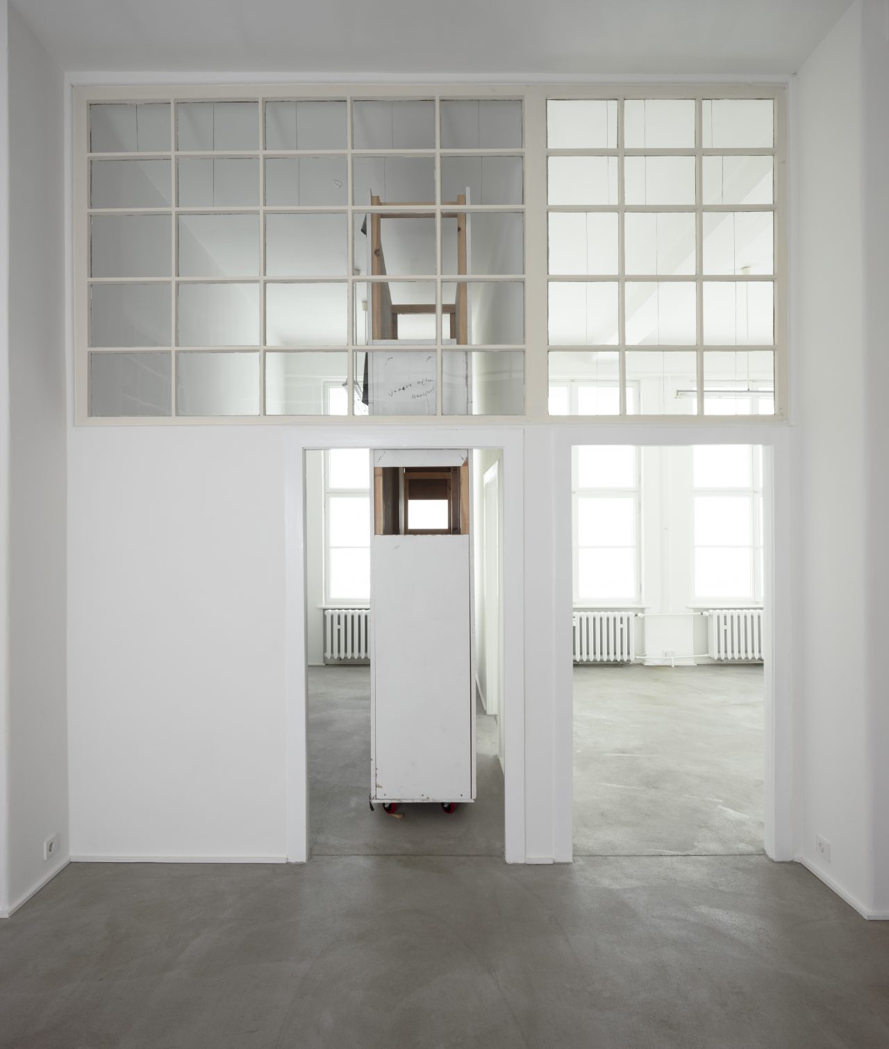 Christopher Williams: Wall designed by Dirk Ufermann, Head Technician, Bonner Kunstverein, Bonn. Constructed by Objekt Design Persighetti Ltd. for the exhibition Open Letter: The Family Drama Refunctioned? (From the Point of View of Production), 17 March - 20 May, 2017, David Zwirner, London after drawings by Pasztori Simons Architects, Berlin with Avery Dennison 507 EF Event Film Matt vinyl installed by Imga Imaging Ltd. Kent, UK (5/6) 2017 Plywood, metal, wood, and adhesive vinyl 350 x 350 x 57 cm Wall constructed by Objekt Design Persighetti Ltd, Leichlingen, Germany Vinyl installed by Igma Imaging Ltd., Kent, UK, 2017 Plywood, metal, wood, and adhesive vinyl 137 7/8 x 137 7/8 x 22 1/2 inches 350 x 350 x 57 cm WILCH0548